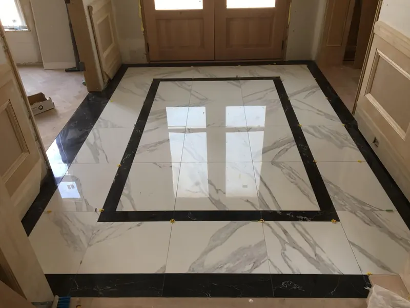 Porcelain marble-imitation tile laid as a main house walkway