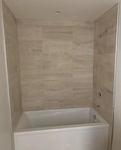 granite tiles installed on a shower